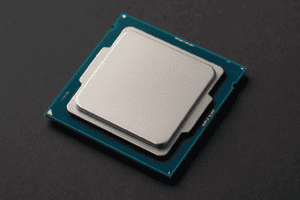 Close-up image of a modern multi-core CPU showing intricate circuits and gold connectors.